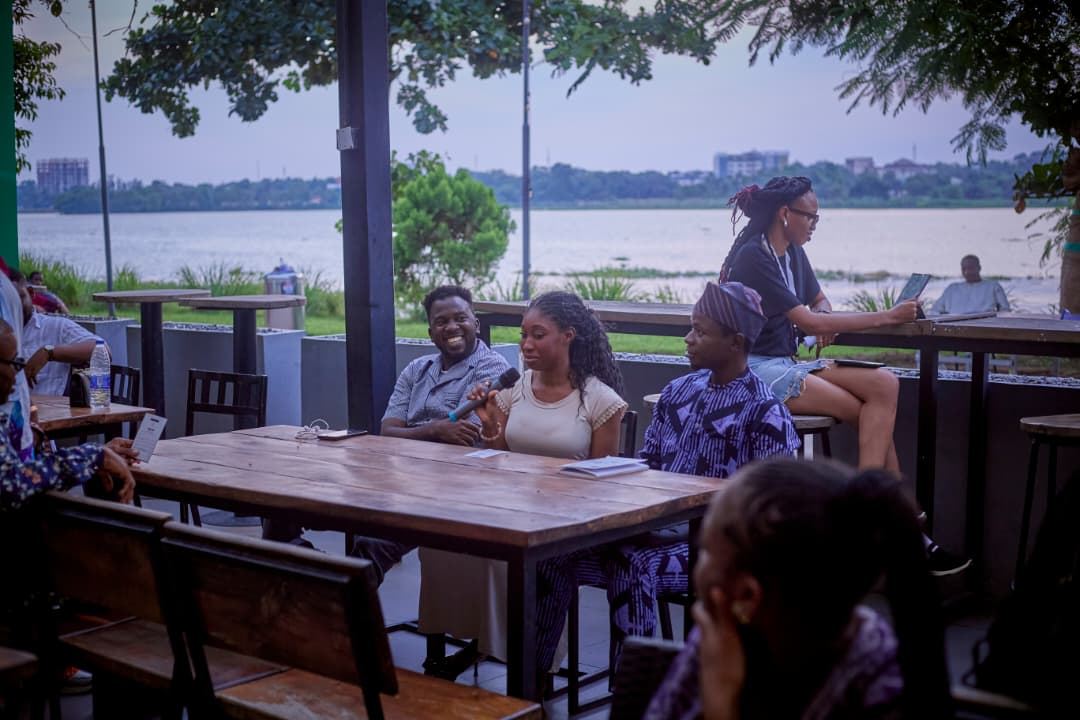 Lakeside café tables before guests arrive.